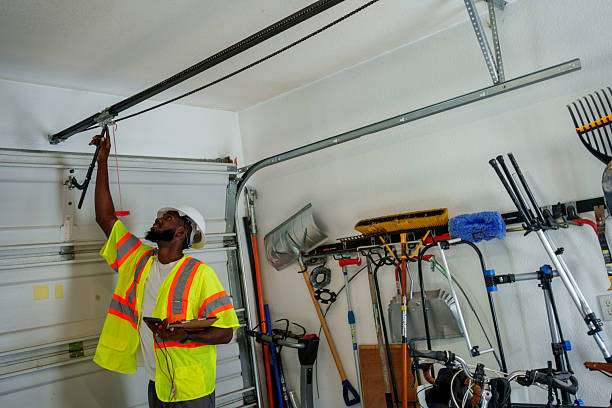 Professional Garage Door Panel Replacement technician working in Demarest, NJ